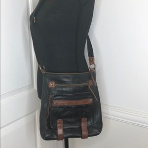 The Sac black and brown soft leather cross body